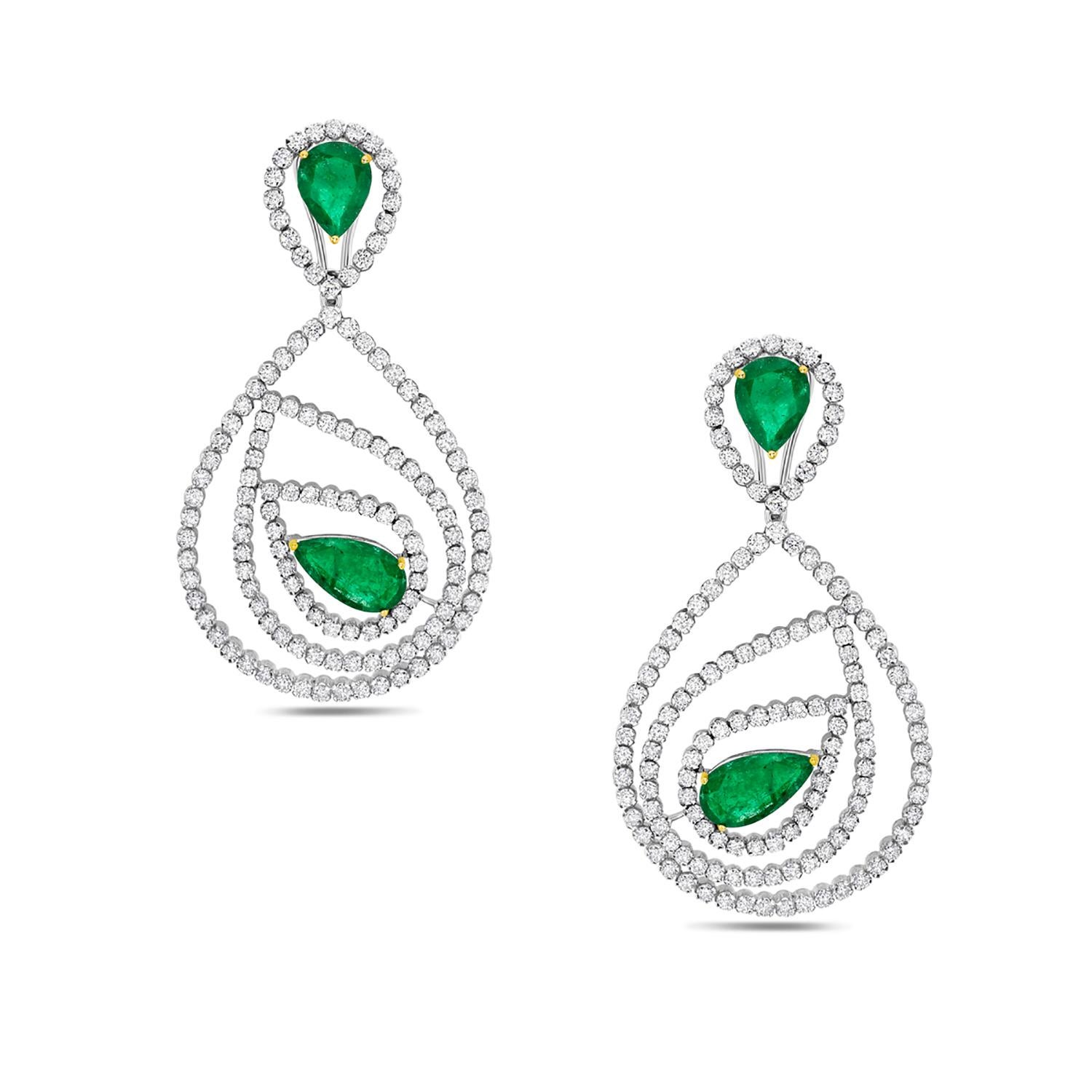 Contemporary Pear Shaped Emerald Earrings Caged in Diamonds Made in 18k White Gold For Sale