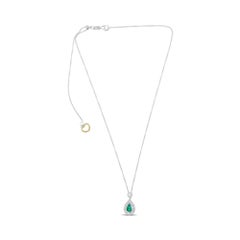 Pear-Shaped Emerald, White Diamond, and 18 Karat White Gold Halo Necklace