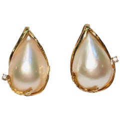 Pear Shaped Mabe Pearl Diamond Leaf Pattern 14 Karat Gold Omega Back Earrings