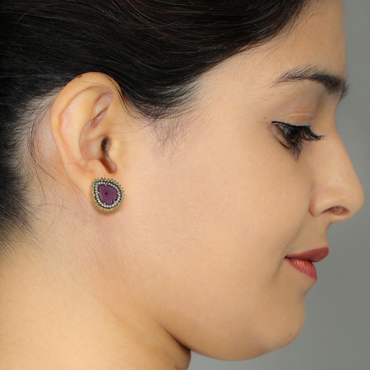 18kt:1.43gms, D:2.00ct, slv:6.22gms, Ruby:8.50ct, 22X19MM