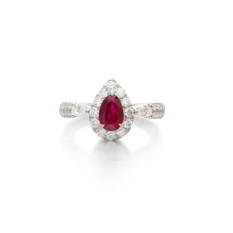 Centering a pear-shaped Burmese ruby, accented by pear and round brilliant-cut diamonds.

Burmese ruby weighing 0.85 carat
Diamonds weighing a total of approximately 0.60 carat
18 karat white gold
Total weight 3.50 grams
Size 5¾

Accompanied by an