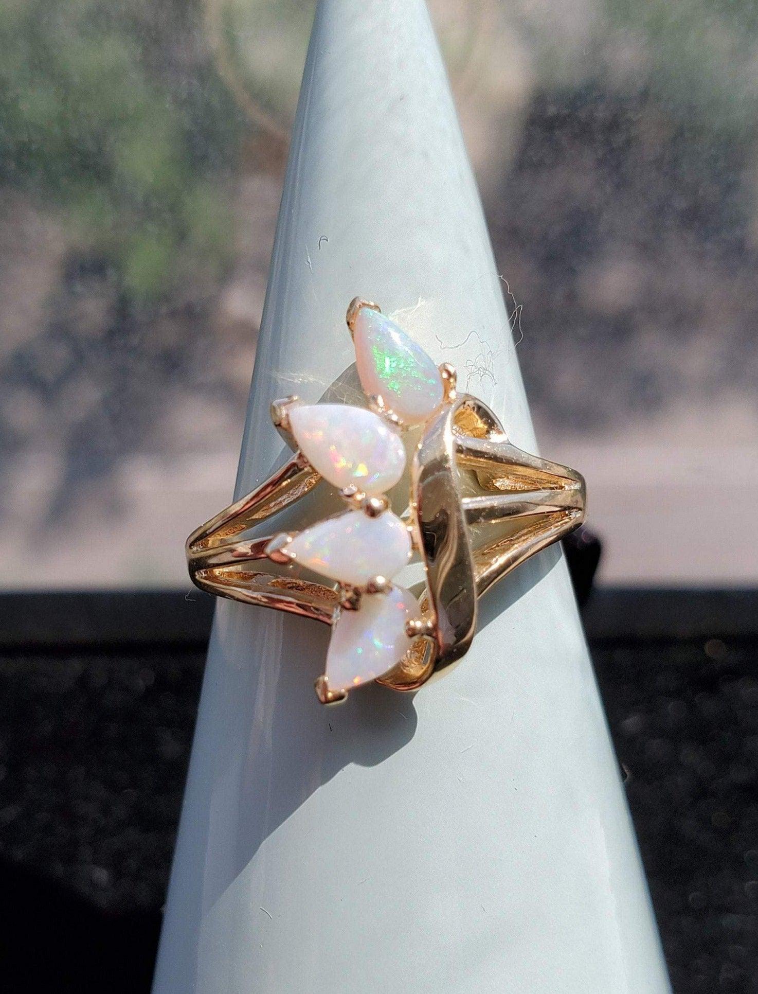 ♥ Product Summary ♥

Main Stone: Australian Opal
Weight: 3 grams
Stone Cut: Pear
Band Material: 10k Yellow Gold

**Due to the uniqueness of the opal stone, there are flashes of iridescent colors when it is viewed from different angles, when the