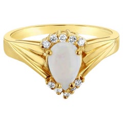 Pear Shaped Opal with Diamond Accents 14k Yellow Gold