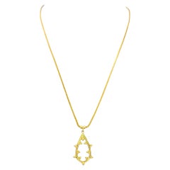 Collier pendentif ouvert en or jaune 18 carats en forme de poire avec grappes de perles