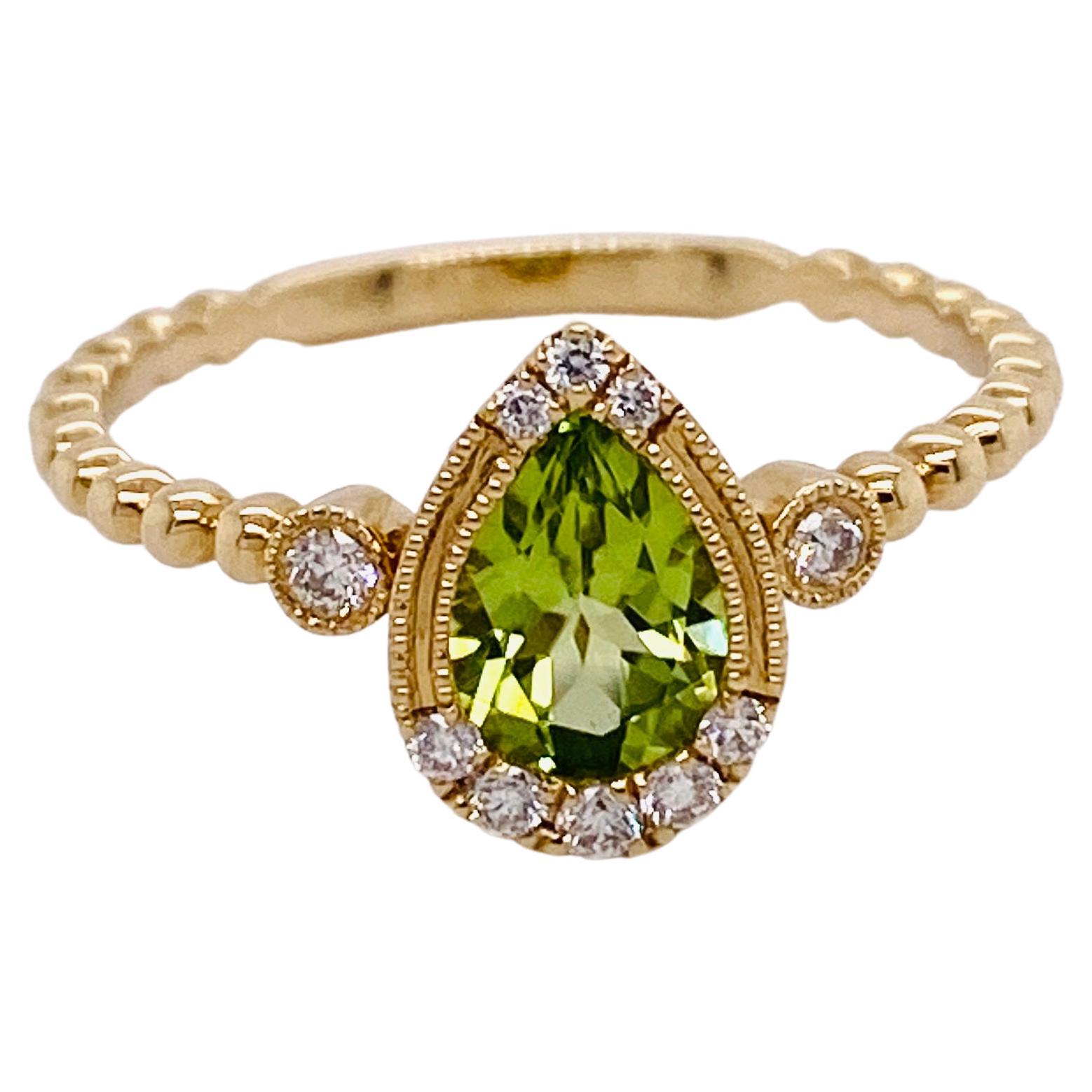 Pear-Shaped Peridot Bezel with Diamonds Ring in 14K Yellow Gold For Sale