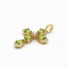 Pear-Shaped Peridots Floral Cross Pendant Silver, gold