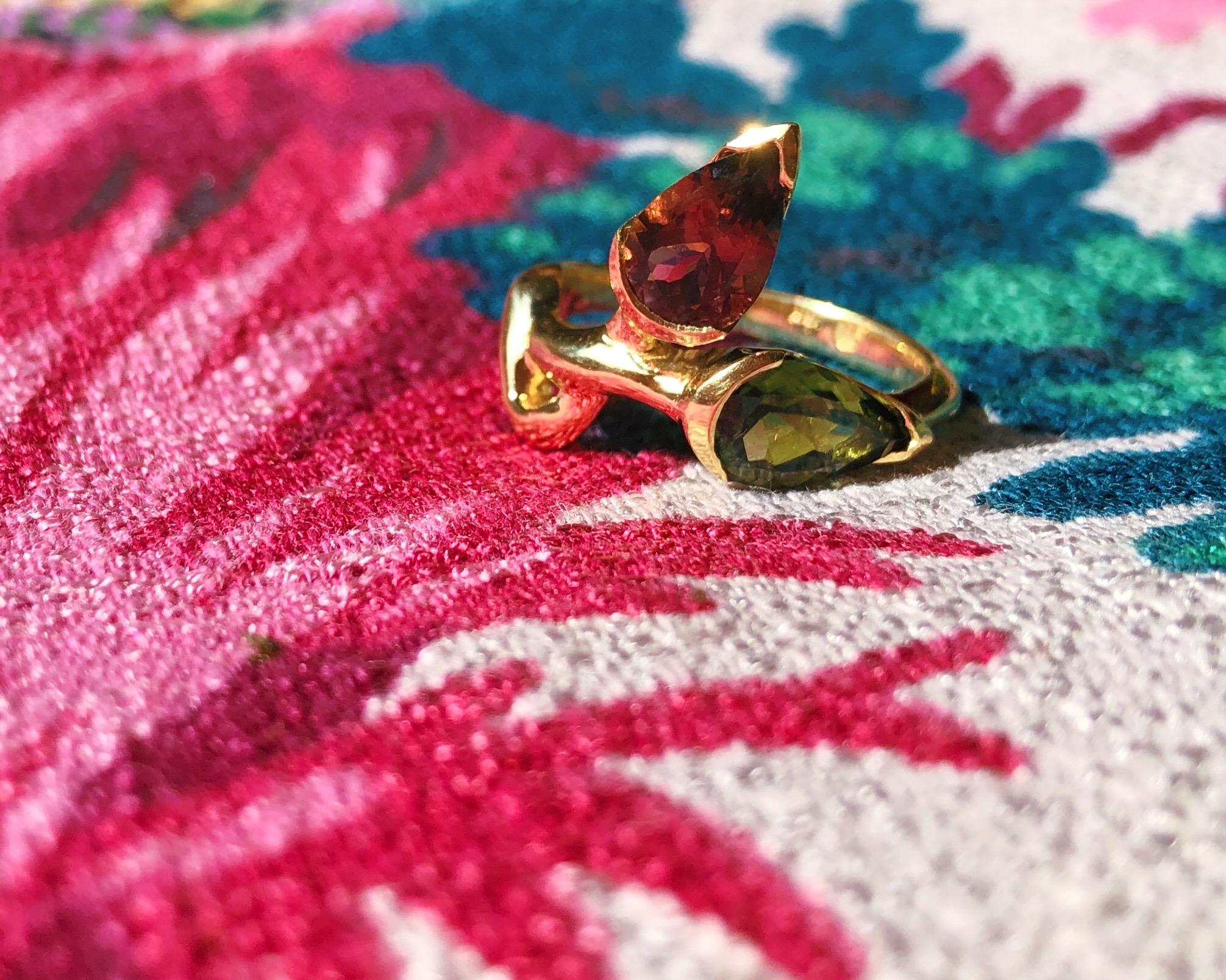 The Rosebud Ring with Pink and Green Tourmaline from modern fine jewelry house, Baker & Black. Artful with just a touch of whimsy, this pear shaped tourmaline ring brings distinction to any getup. 

• pink tourmaline
• green tourmaline
• measures