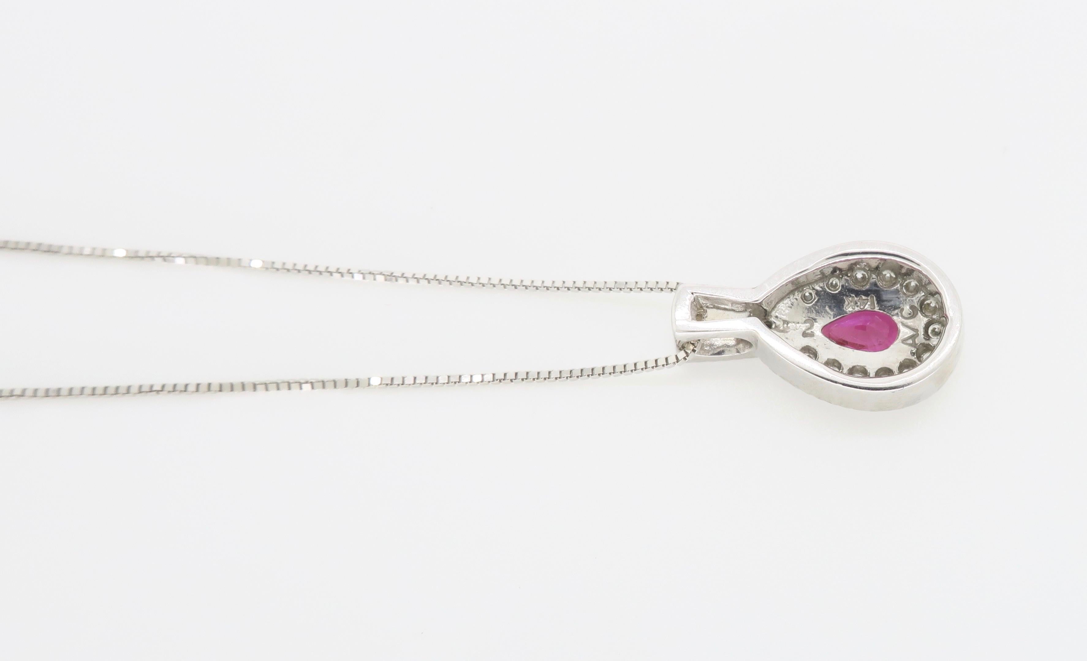 Pear Cut Pear Shaped Ruby and Diamond Halo Pendant Necklace