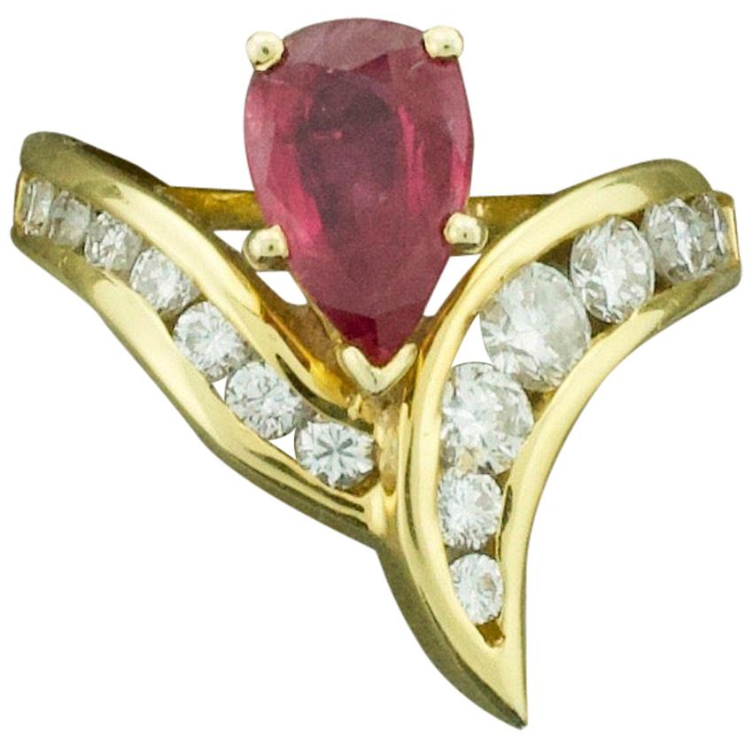 Pear Shaped Ruby and Diamond Ring in 18 Karat For Sale
