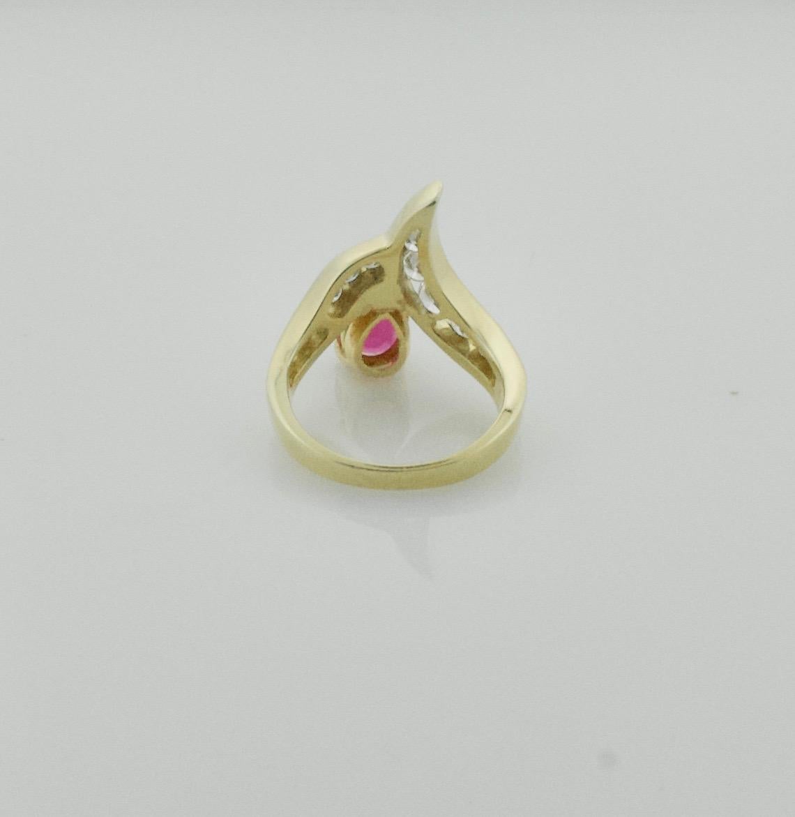 Pear Cut Pear Shaped Ruby and Diamond Ring in 18 Karat For Sale