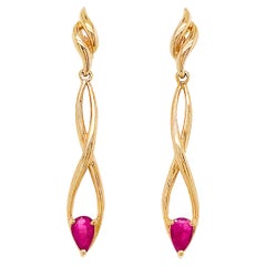 pear shaped ruby earrings Pear Shaped Ruby Gemstone Infinity Long Earring Drops in 14 Karat Yellow Gold
