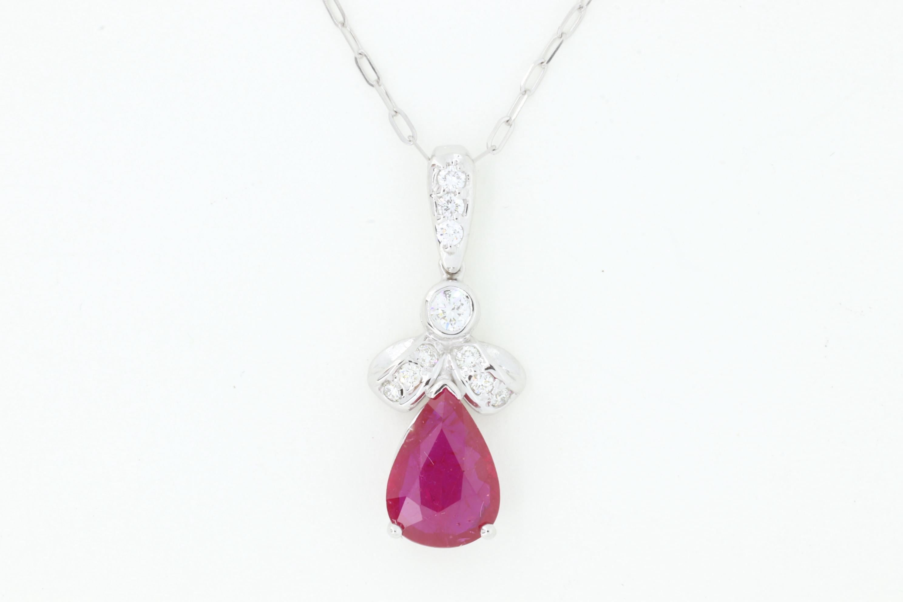 14K White Gold

1 Pear Shape Ruby at approximately 1.60 Carats Total Weight - Measures 9 x 7 millimeters

0.24 Carats Total Weight of Round Brilliant White Diamonds

Color: H-I / Clarity: SI 

Fine one-of-a-kind craftsmanship meets incredible