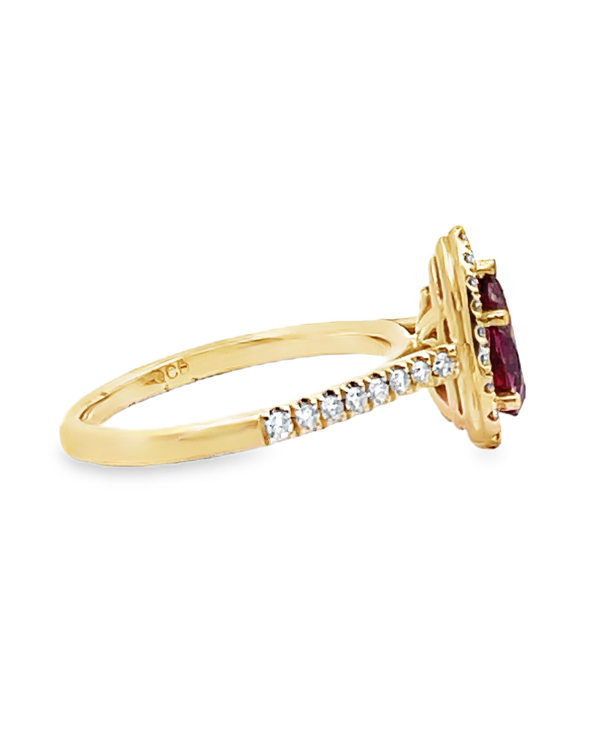 Pear Cut Pear Shaped Ruby Ring with Halo Diamonds Set in 14K Yellow Gold For Sale