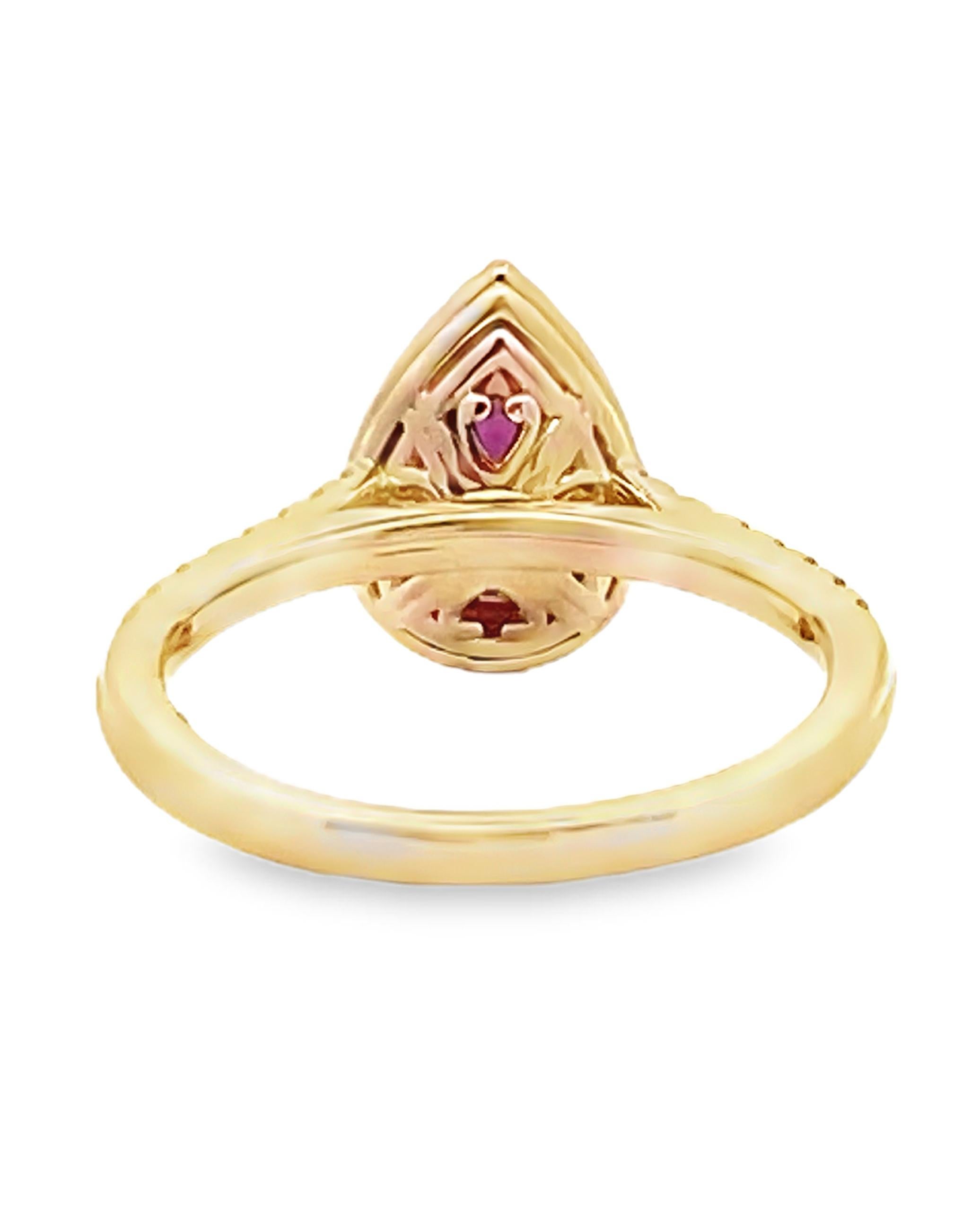 Pear Shaped Ruby Ring with Halo Diamonds Set in 14K Yellow Gold In New Condition For Sale In Old Tappan, NJ