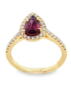 Pear Shaped Ruby Ring with Halo Diamonds Set in 14K Yellow Gold
