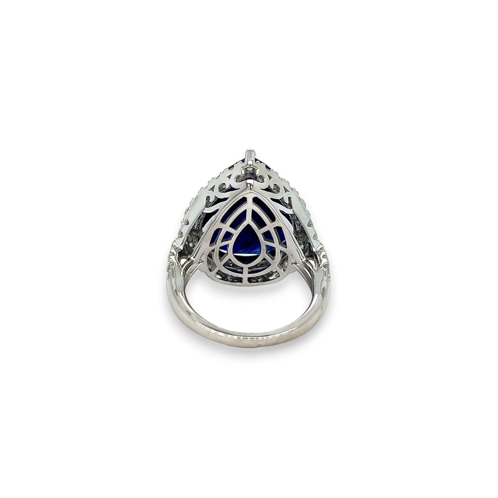 Pear Shaped Sapphire (17.01 carats), Diamond Halo, and Crisscross Band Statement In New Condition For Sale In Lewisville, TX