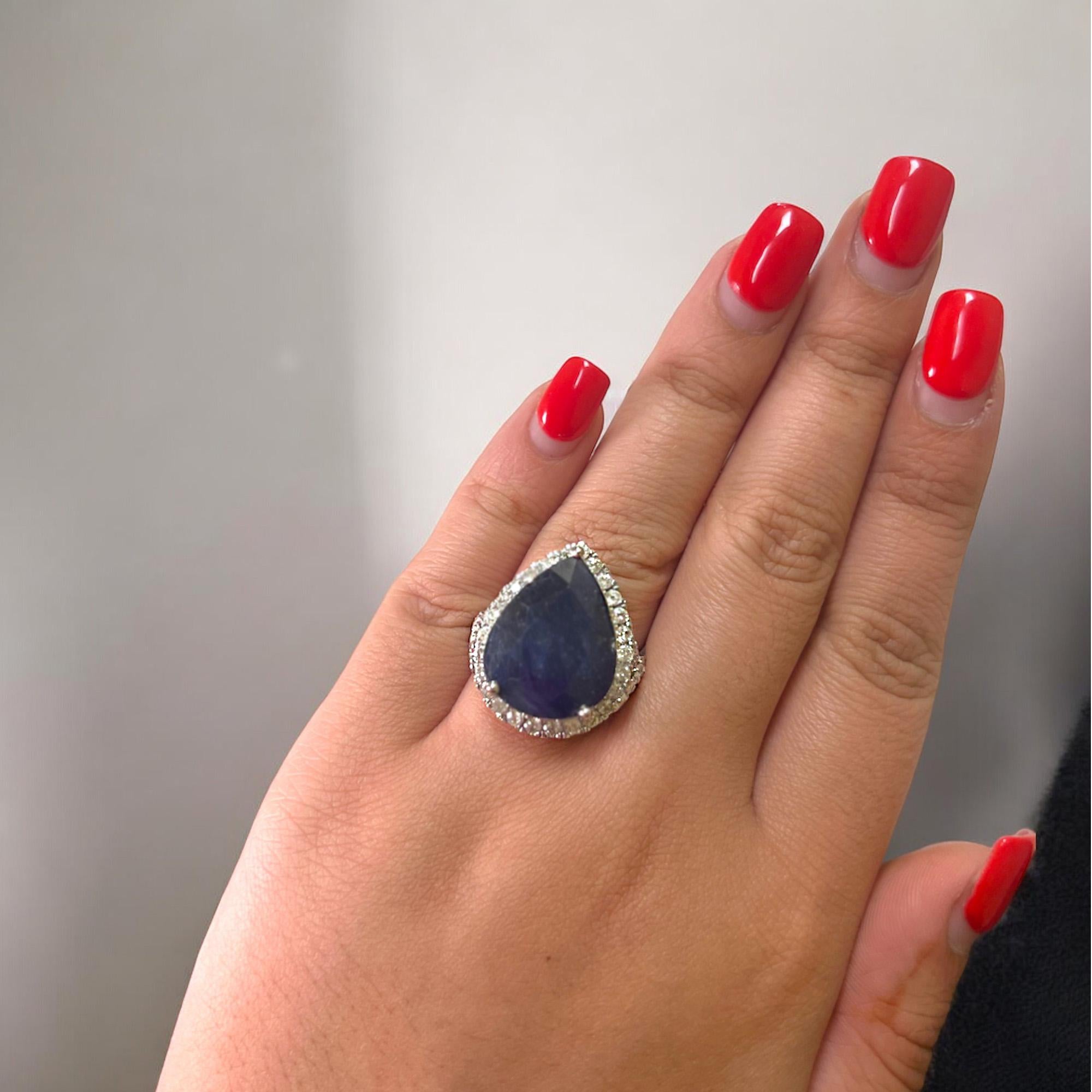 Women's or Men's Pear Shaped Sapphire (17.01 carats), Diamond Halo, and Crisscross Band Statement For Sale