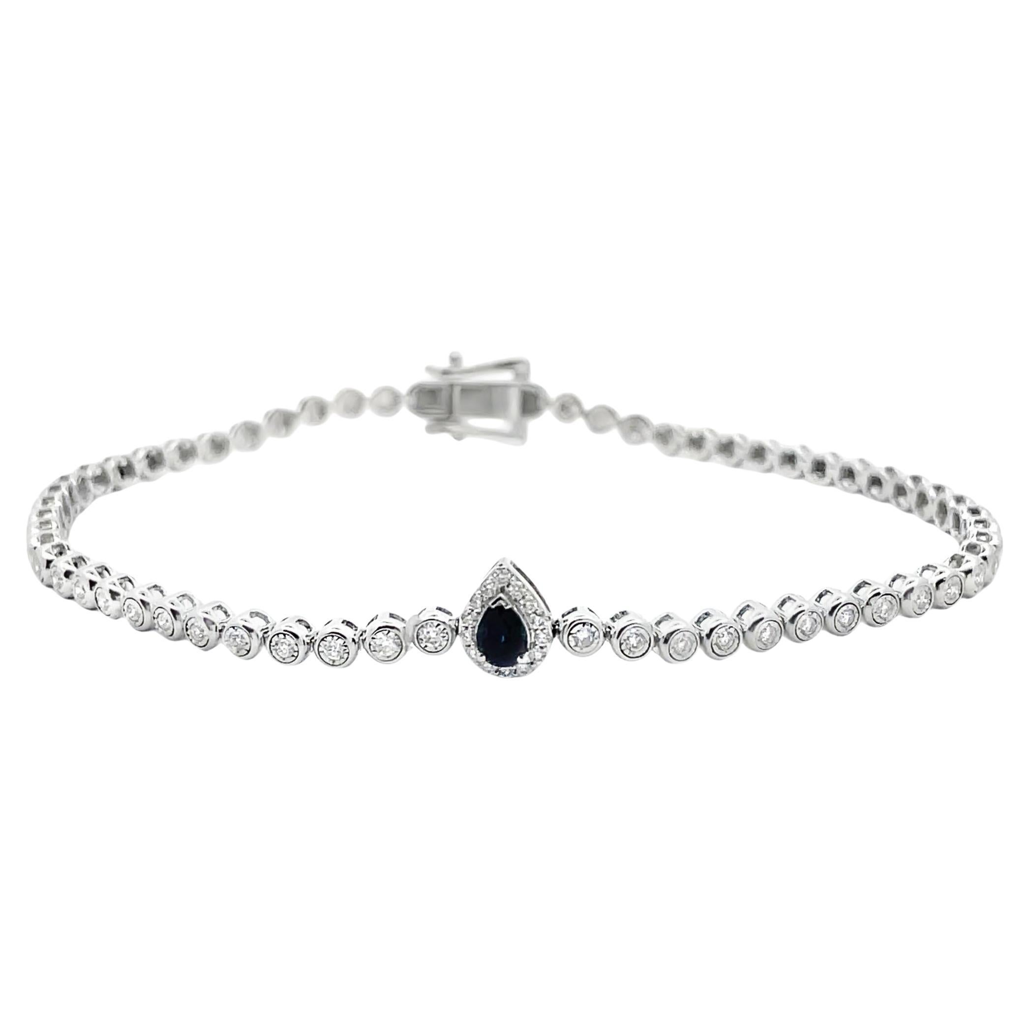Tennisarmband mit birnenförmigem Saphir und Diamanten in Lünettenfassung aus 18 Karat Weißgold im Angebot