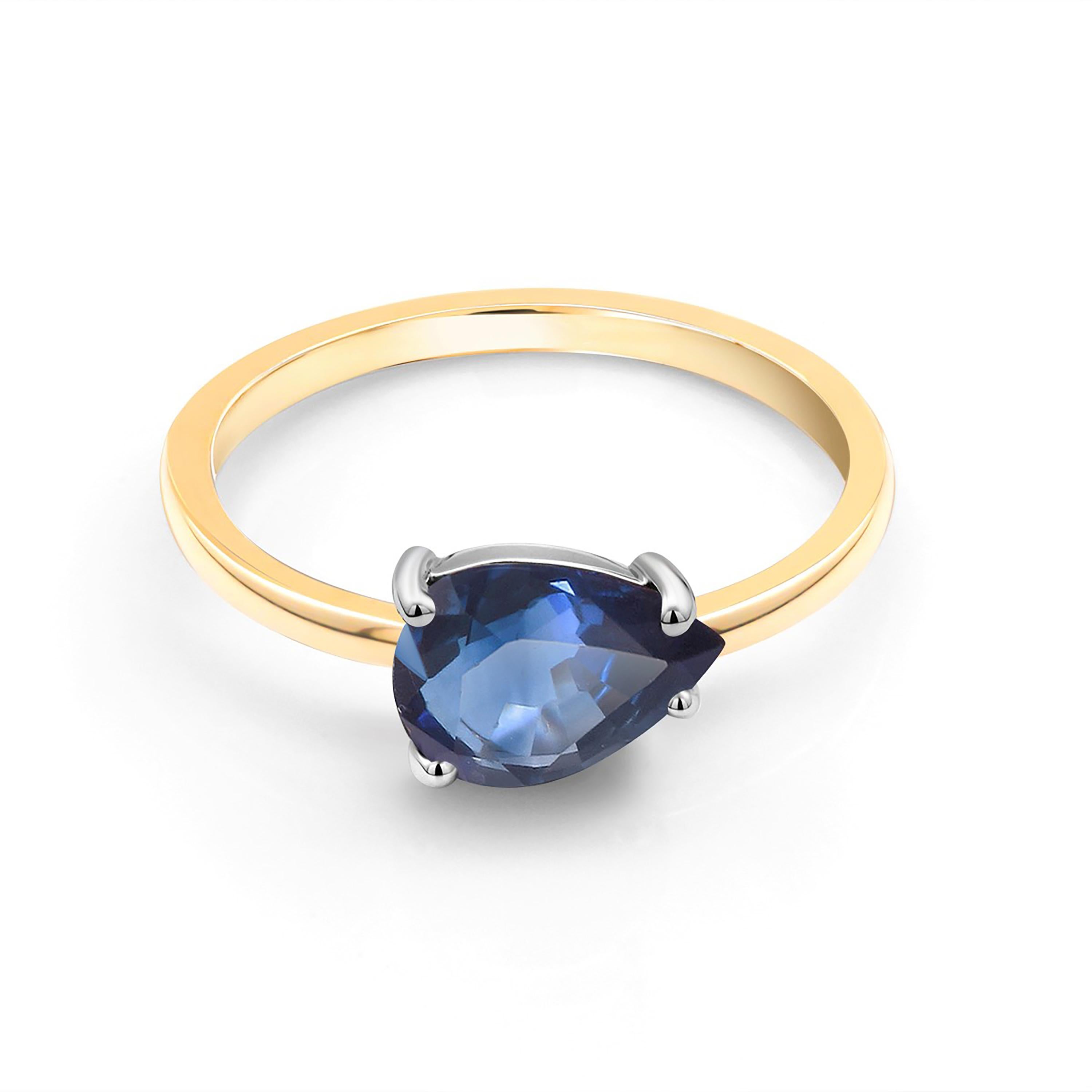Fourteen karats white and yellow gold cocktail ring
Bright and brilliant pear-shaped blue sapphire weighing 2.20 carats      
Sapphire hue color is of royal blue tone                                                                 
Ring size 7 In