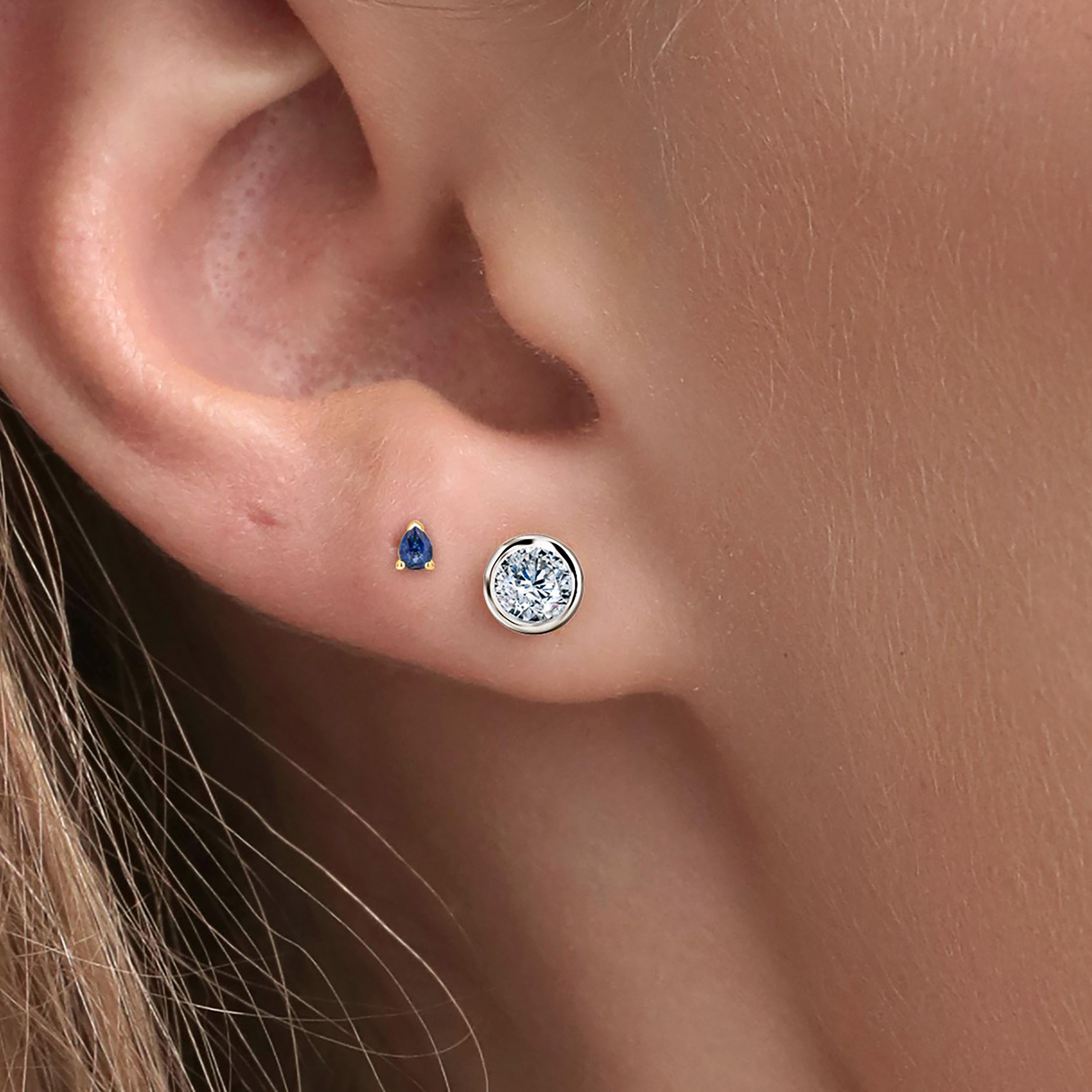 third stud earrings