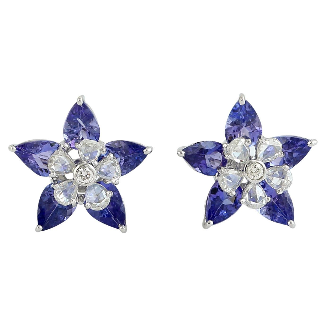 Borchie a stella con tanzanite e diamanti a forma di pera in oro bianco 18 carati