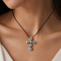 Pear-Shaped Topazs Floral Cross Pendant Silver, gold