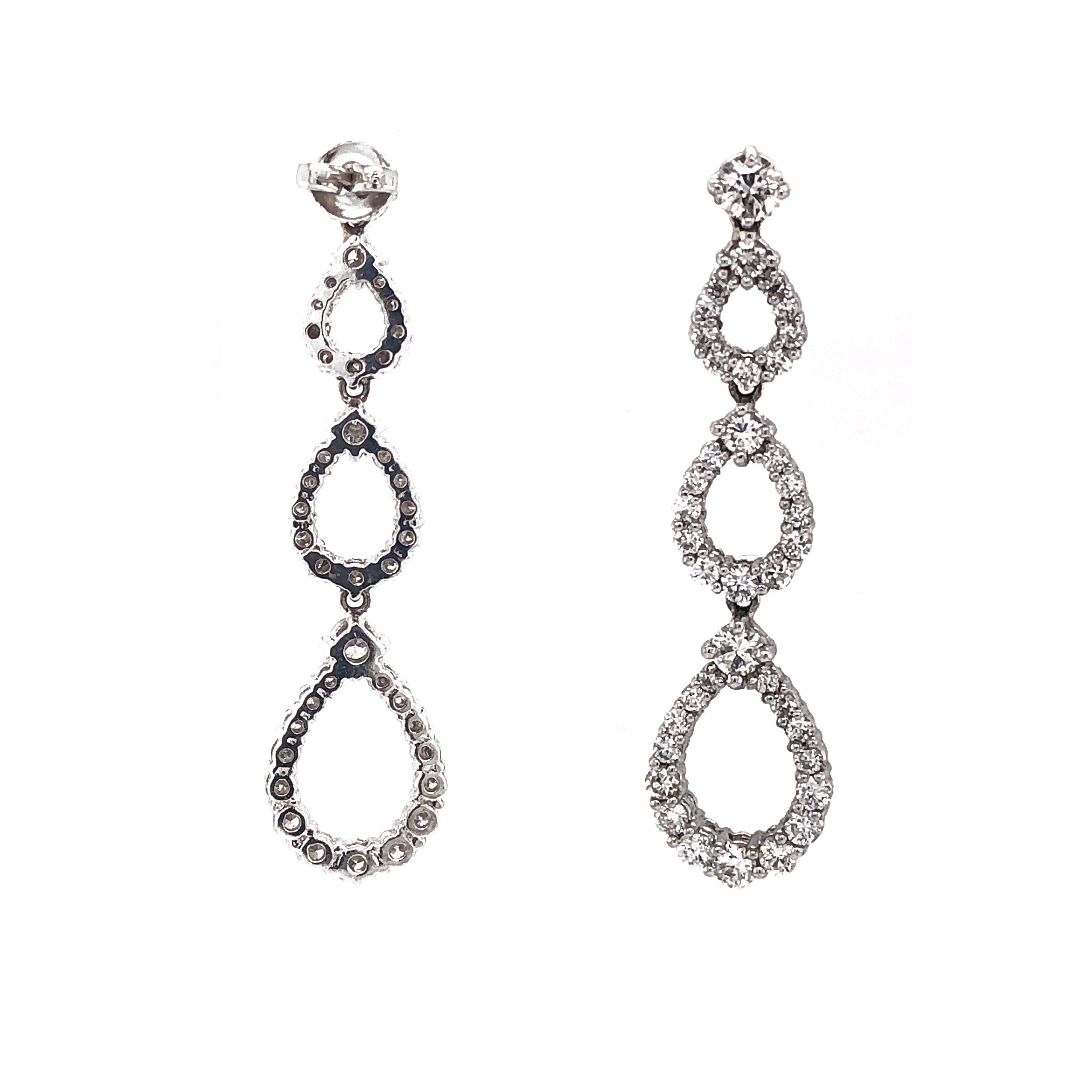 Contemporary Pear Shapes Round Cut White Diamonds 4.53 Carat Dangling Platinum Earrings For Sale