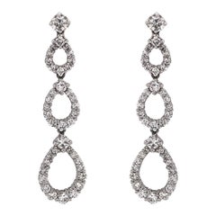 Pear Shapes Round Cut White Diamonds 4.53 Carat Dangling Platinum Earrings