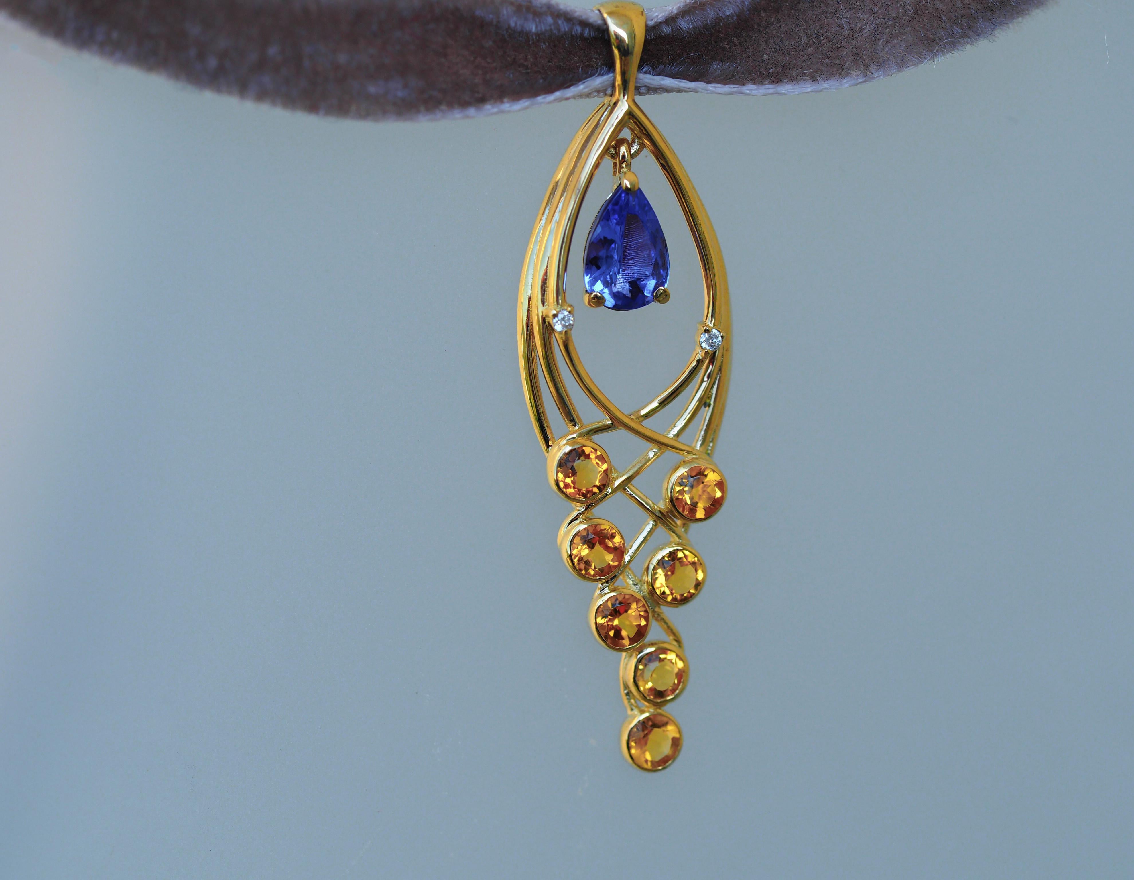 Pear tanzanite 14k gold pendant.  For Sale 1