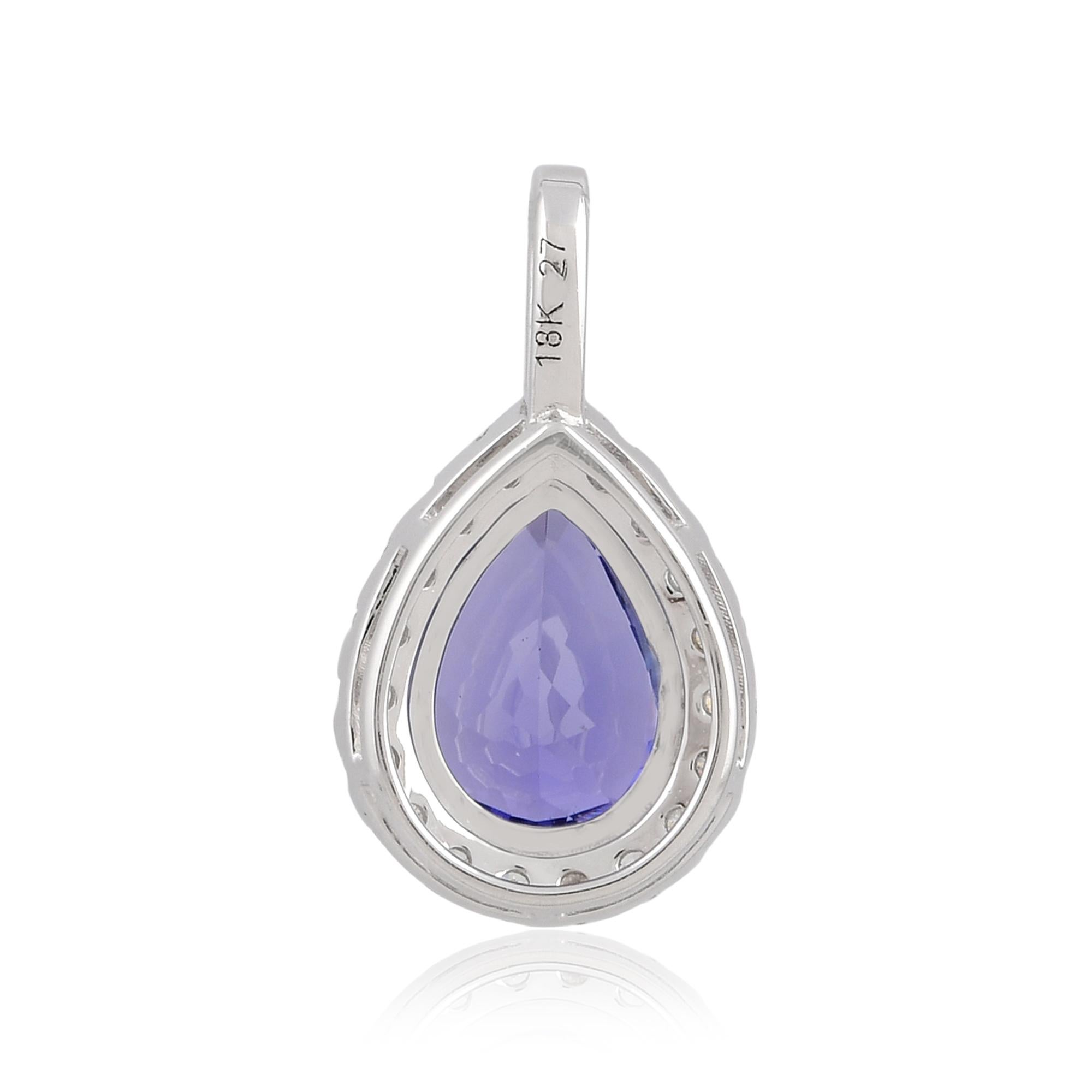The pendant is expertly crafted in 18 karat white gold, chosen for its timeless appeal and enduring beauty. The white gold setting complements the Tanzanite and diamonds, creating a harmonious blend of sophistication and refinement.

Item Code :-