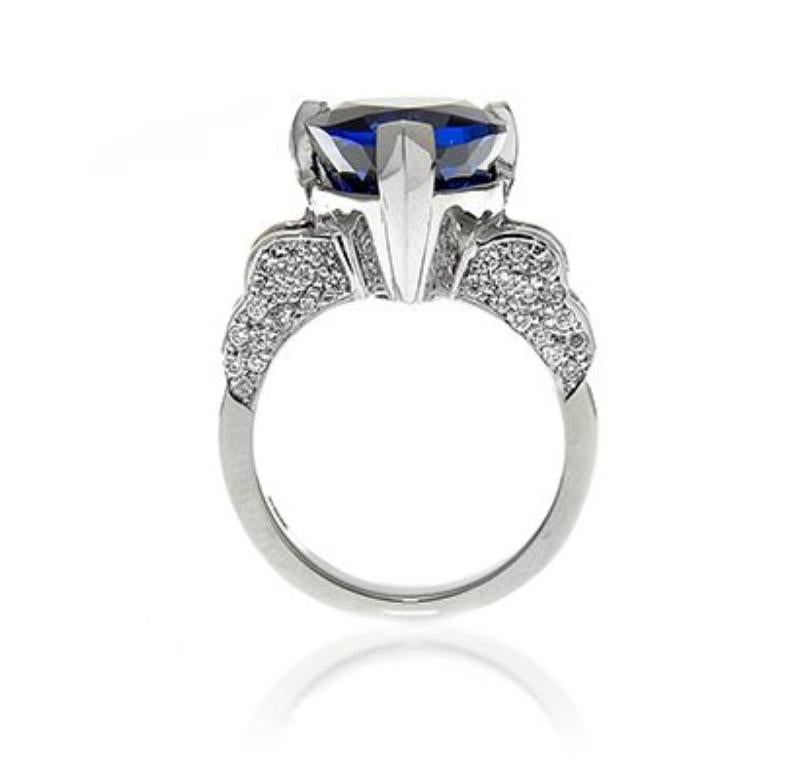 Modern 18k White Gold 12.08ct Pear Tanzanite Ring with 1.76ct Diamonds For Sale