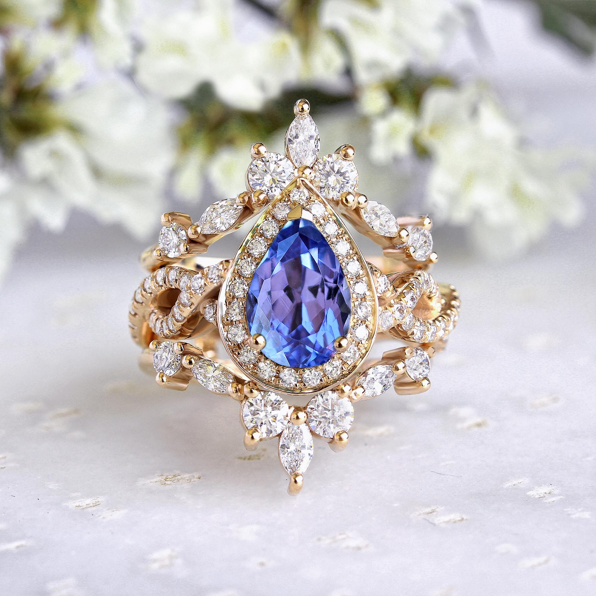 Pear tanzanite with halo and infinity twist shank engagement ring - with diamond ring guard enhancer 
