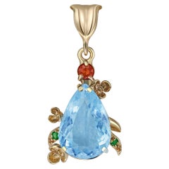 Pendentif Topaze poire en or 14 carats. 