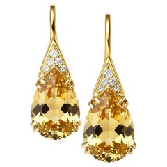 Pear topaz silver, gold earrings