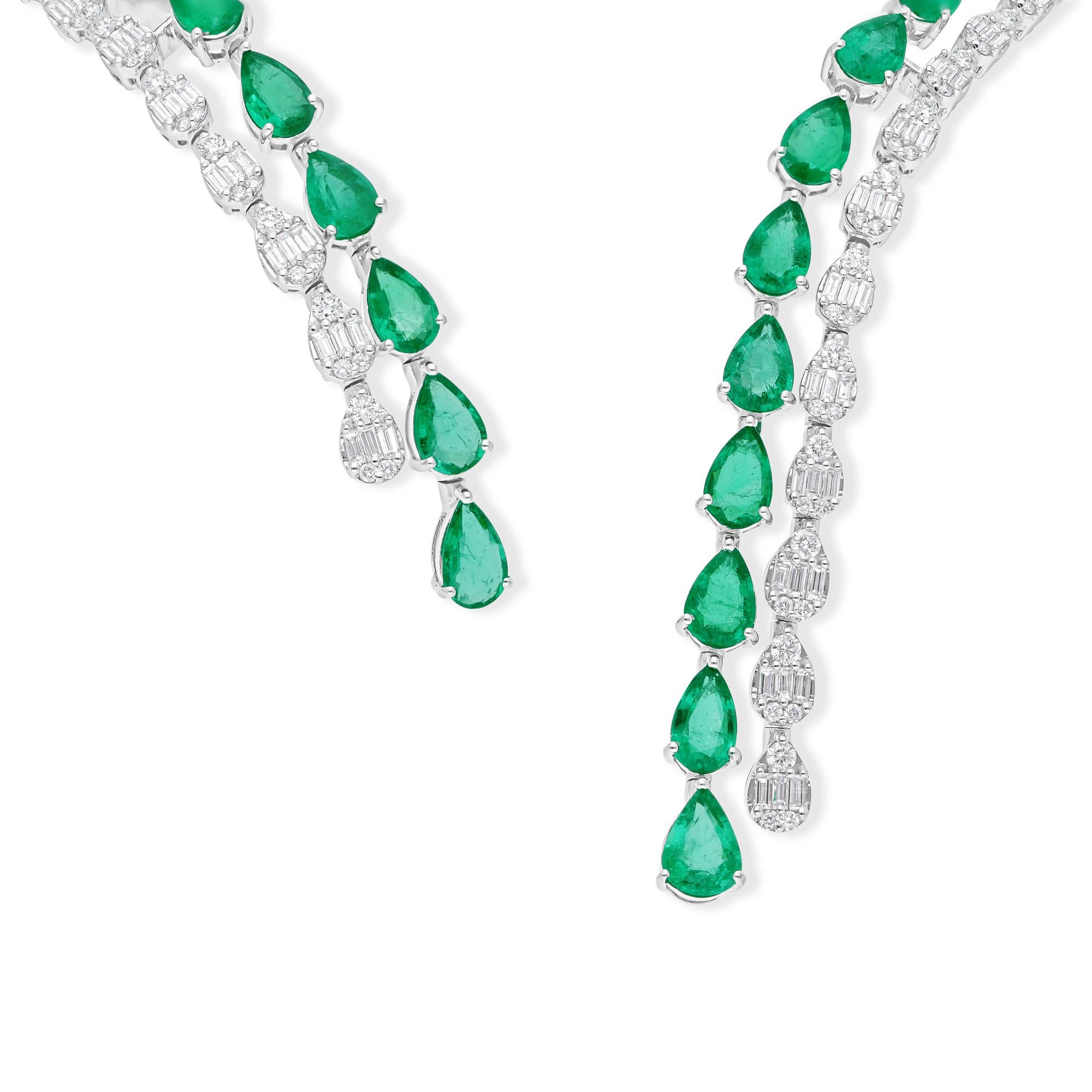 Cast from 14-karat gold, these exquisite necklace is handset with 20.28 carats Zambian emerald and 4.46 carats of sparkling diamonds.

FOLLOW SPECTRUM JEWELS storefront to view the latest collection & exclusive pieces. Spectrum Jewels is proudly