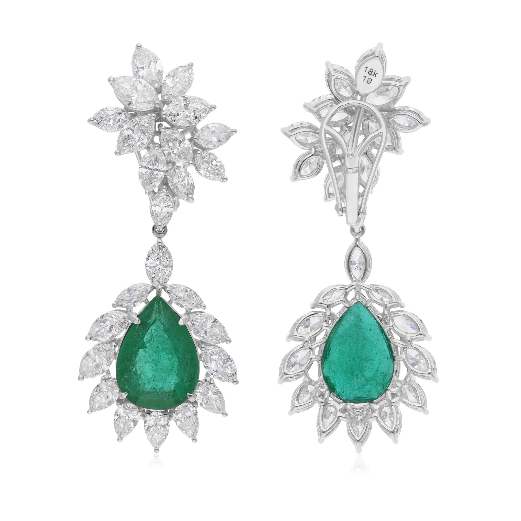 Diese exquisiten Ohrringe aus 14-karätigem Gold sind mit einem sambischen Smaragd von 9,63 Karat und funkelnden Diamanten von 10,58 Karat besetzt.

FOLLOW SPECTRUM JEWELS Storefront, um die neueste Collection'S und exklusive Stücke zu sehen.