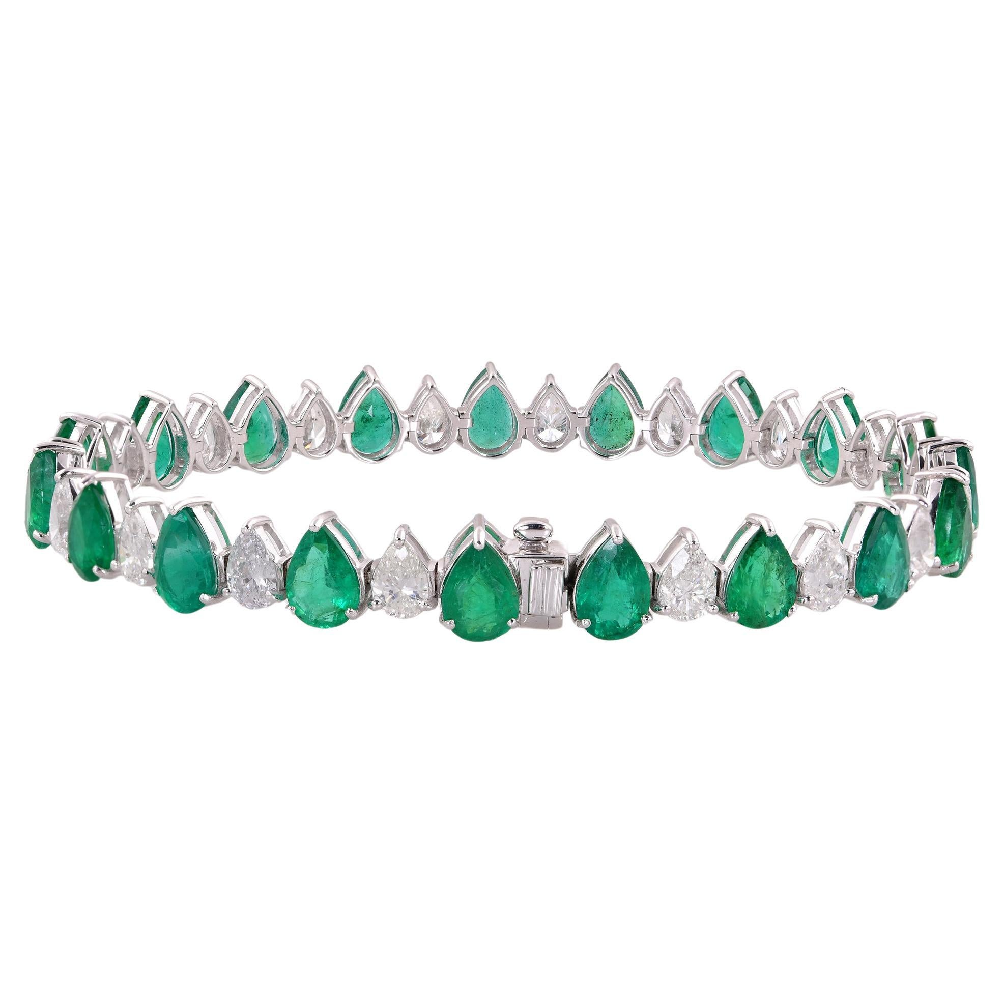 Indulge in the timeless beauty of this exquisite Pear Zambian Emerald Gemstone Bracelet, meticulously crafted with shimmering diamonds in radiant 14 karat white gold. This stunning piece of fine jewelry is a celebration of sophistication, elegance,