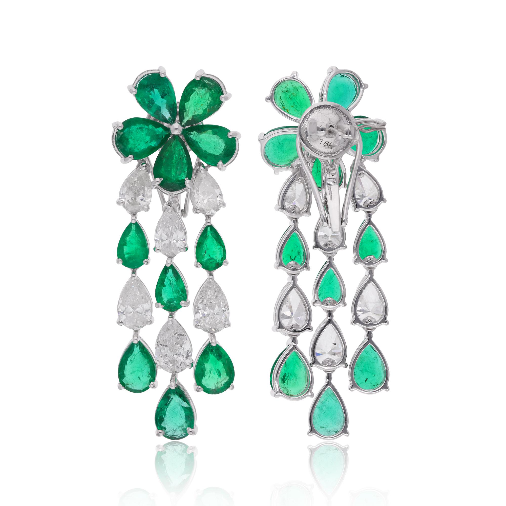 Elevate your style to new heights with the mesmerizing elegance of these Pear Zambian Emerald Gemstone Chandelier Earrings, embellished with sparkling Diamonds and expertly crafted in luxurious 14 Karat White Gold. These exquisite earrings are a