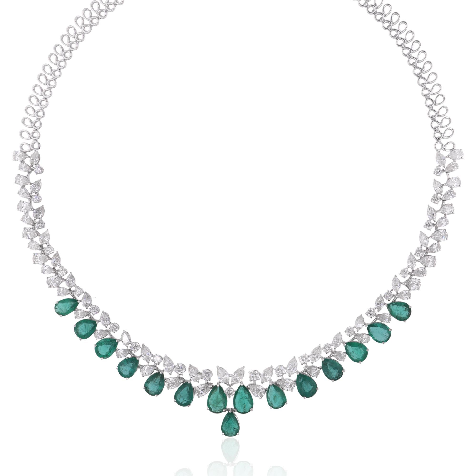 Elevate your style with the luxurious charm of this Pear Zambian Emerald Gemstone Choker Necklace, accented by shimmering Diamonds and meticulously crafted in 14k White Gold. This exquisite piece of jewelry is a celebration of sophistication and