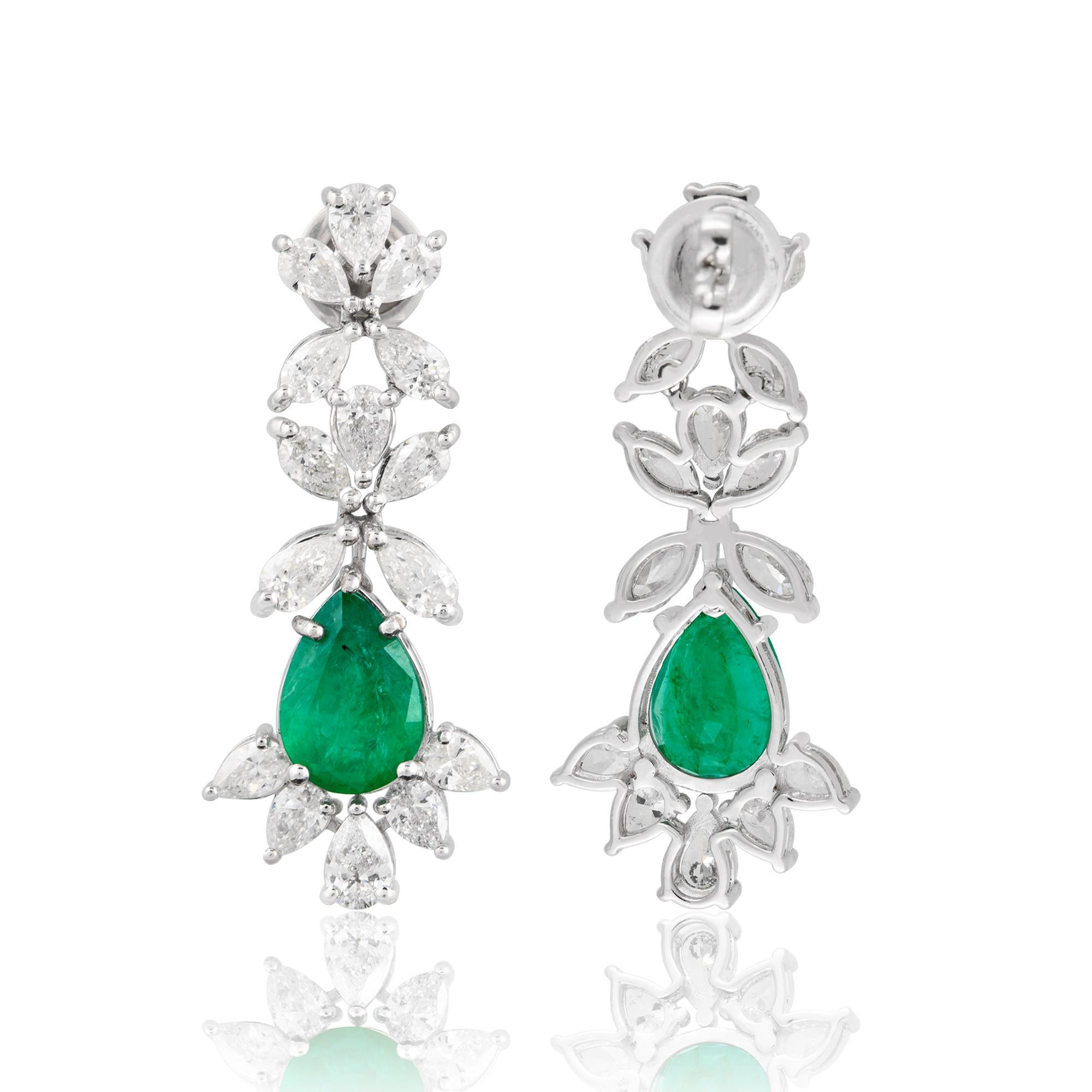Item Code :- SEE-12387
Gross Wt. :- 10.26 gm
18k Solid White Gold Wt. :- 8.55 gm
Natural Diamond Wt. :- 4.40 Ct. ( AVERAGE DIAMOND CLARITY SI1-SI2 & COLOR H-I )
Zambian Emerald Wt. :- 4.15 Ct.
Earrings Size :- 37 mm approx.

✦