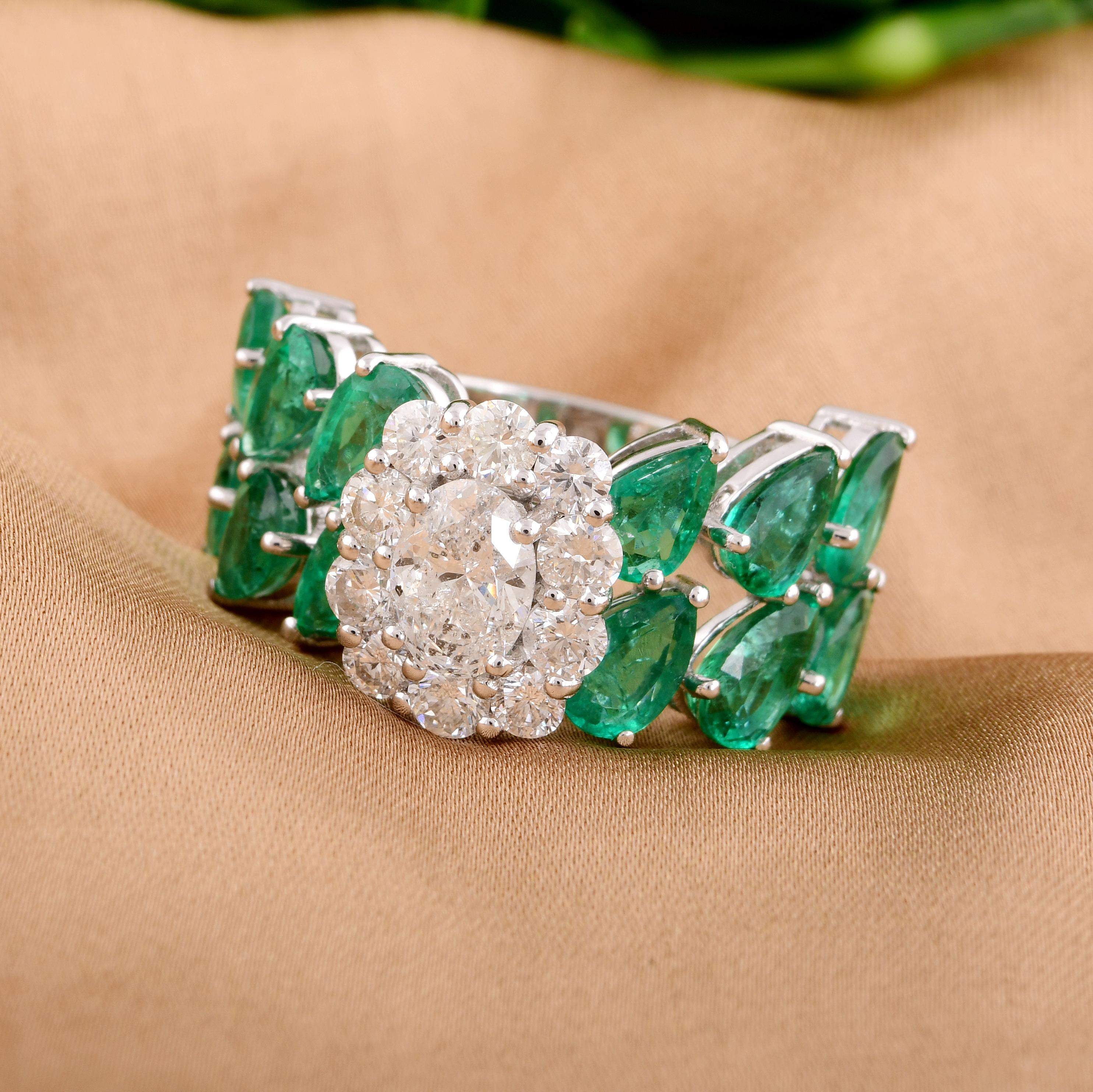 This handmade ring is a timeless and elegant choice, suitable for both formal occasions and everyday wear. It is a statement piece that showcases the natural allure of the emerald and the brilliance of the diamonds, making it a cherished addition to