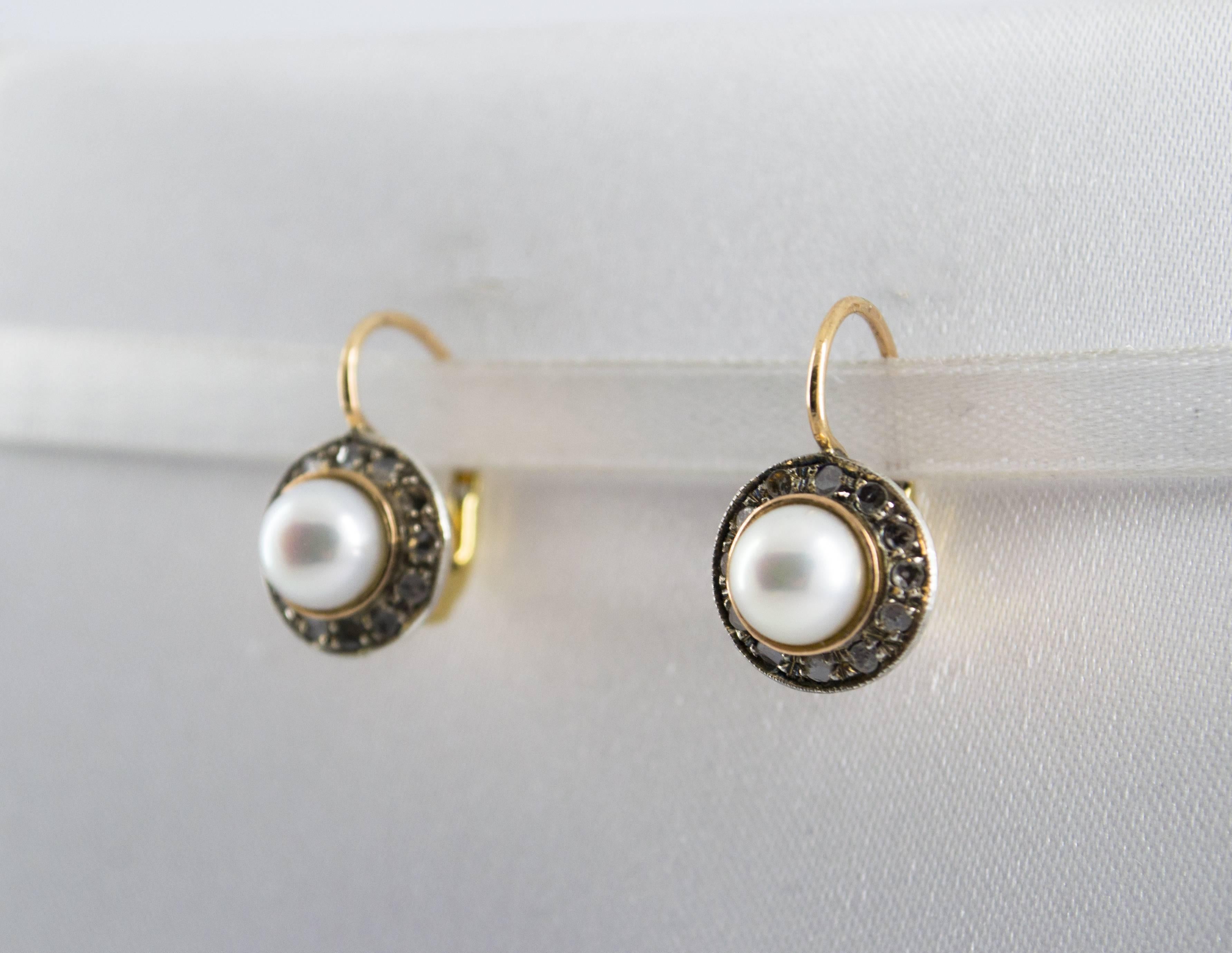 These Earrings are made of 9K Yellow Gold and Sterling Silver.
These Earrings have 0.20 Carats of Diamonds.
These Earrings have also Pearls.
We're a workshop so every piece is handmade, customizable and resizable.