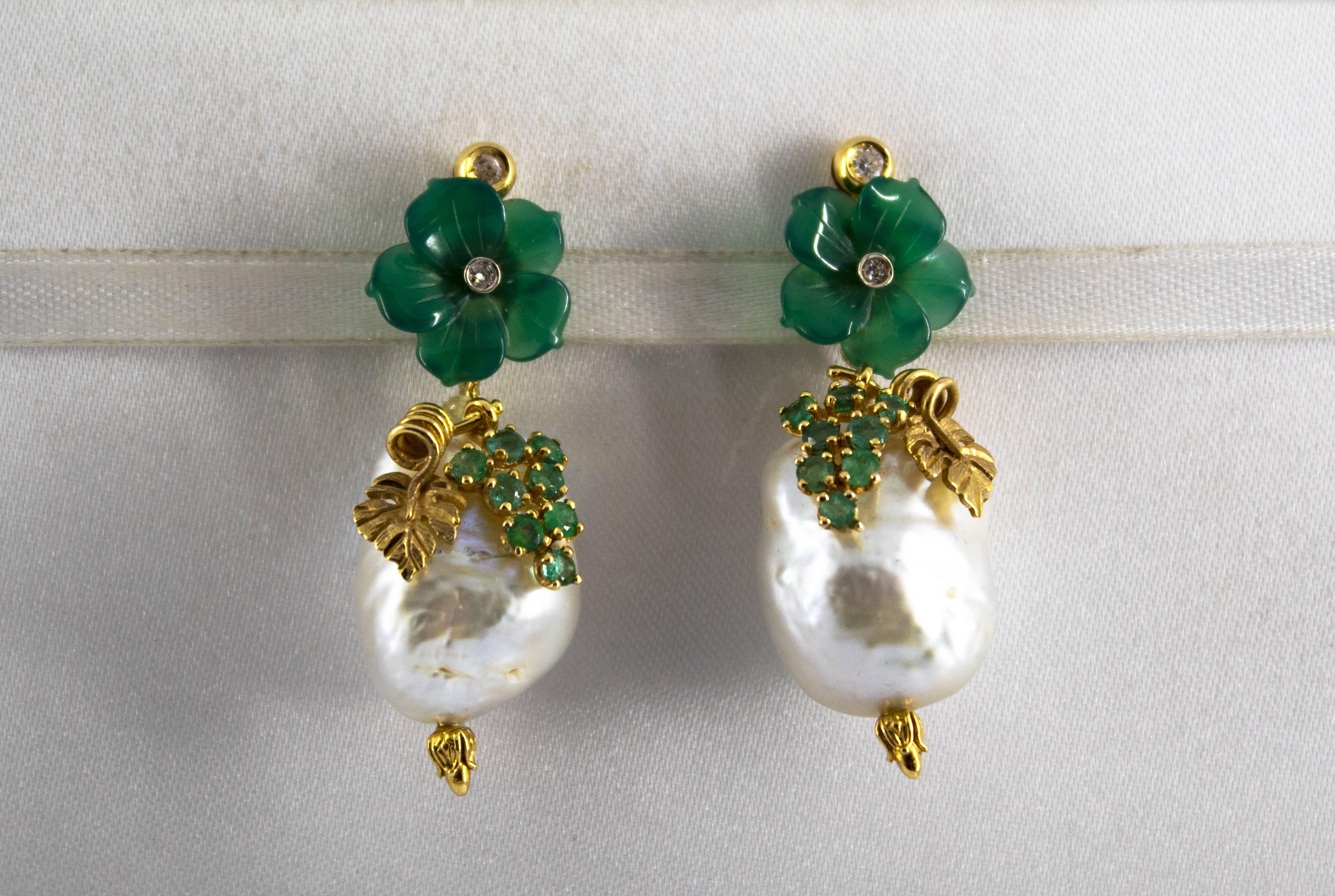 These Stud Earrings are made of 14K Yellow Gold.
These Earrings have 0.12 Carats of Diamonds.
These Earrings have 0.90 Carats of Emeralds.
These Earrings have also Pearls and Agate.
We're a workshop so every piece is handmade, customizable and