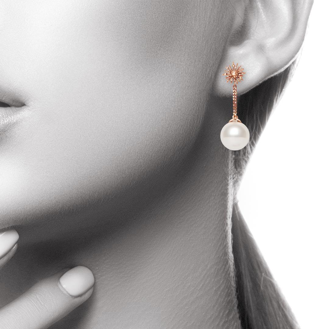 The ‘Soleil’ Pearl Drop Earrings by Natalie Barney feature 9mm Freshwater Pearls which gently dangle underneath the sun shaped studs. They are elegant whilst discreet and can be worn day or night.

Made in 9 karat rose gold. 

Radiate love, life and