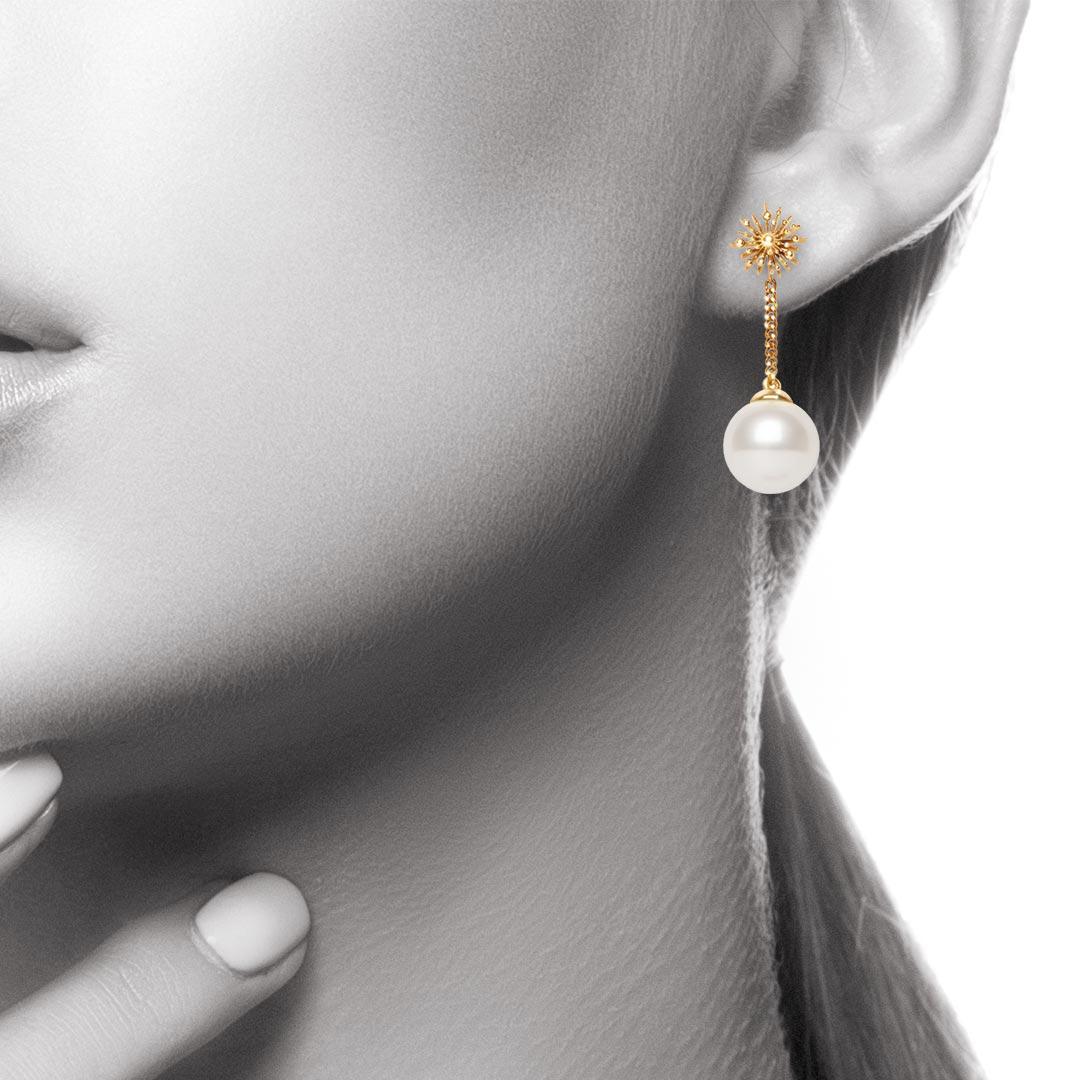 The ‘Soleil’ Pearl Drop Earrings by Natalie Barney feature 9mm Freshwater Pearls which gently dangle underneath the sun shaped studs. They are elegant whilst discreet and can be worn day or night.

Made in 9 karat yellow gold. 

Radiate love, life