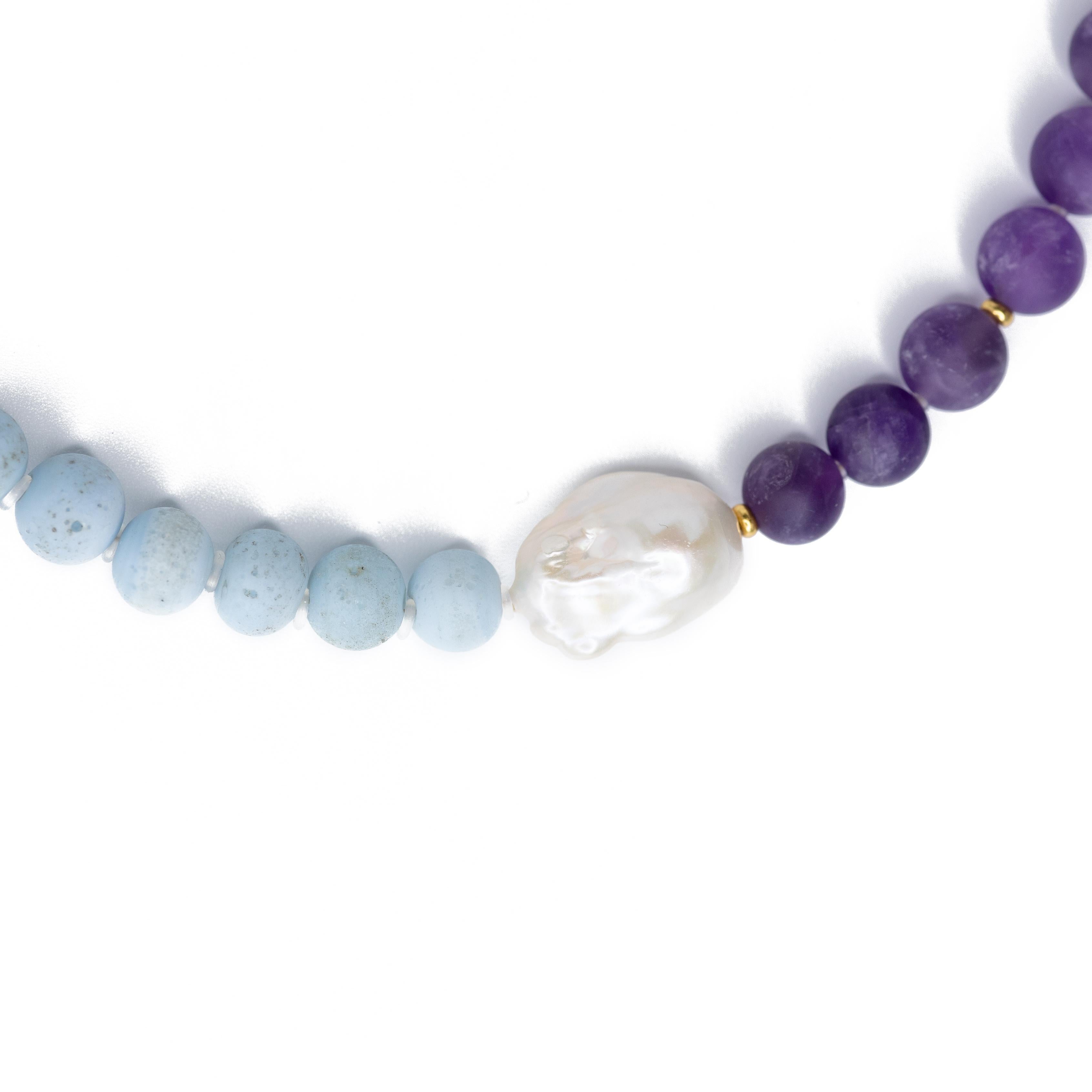 This necklace is a creation of dreams. It carries the essence of boldness and originality. Wearing it, you’ll feel like a story waiting to be told, standing out with a blend of practicality and luxury that whispers of far-off places and timeless