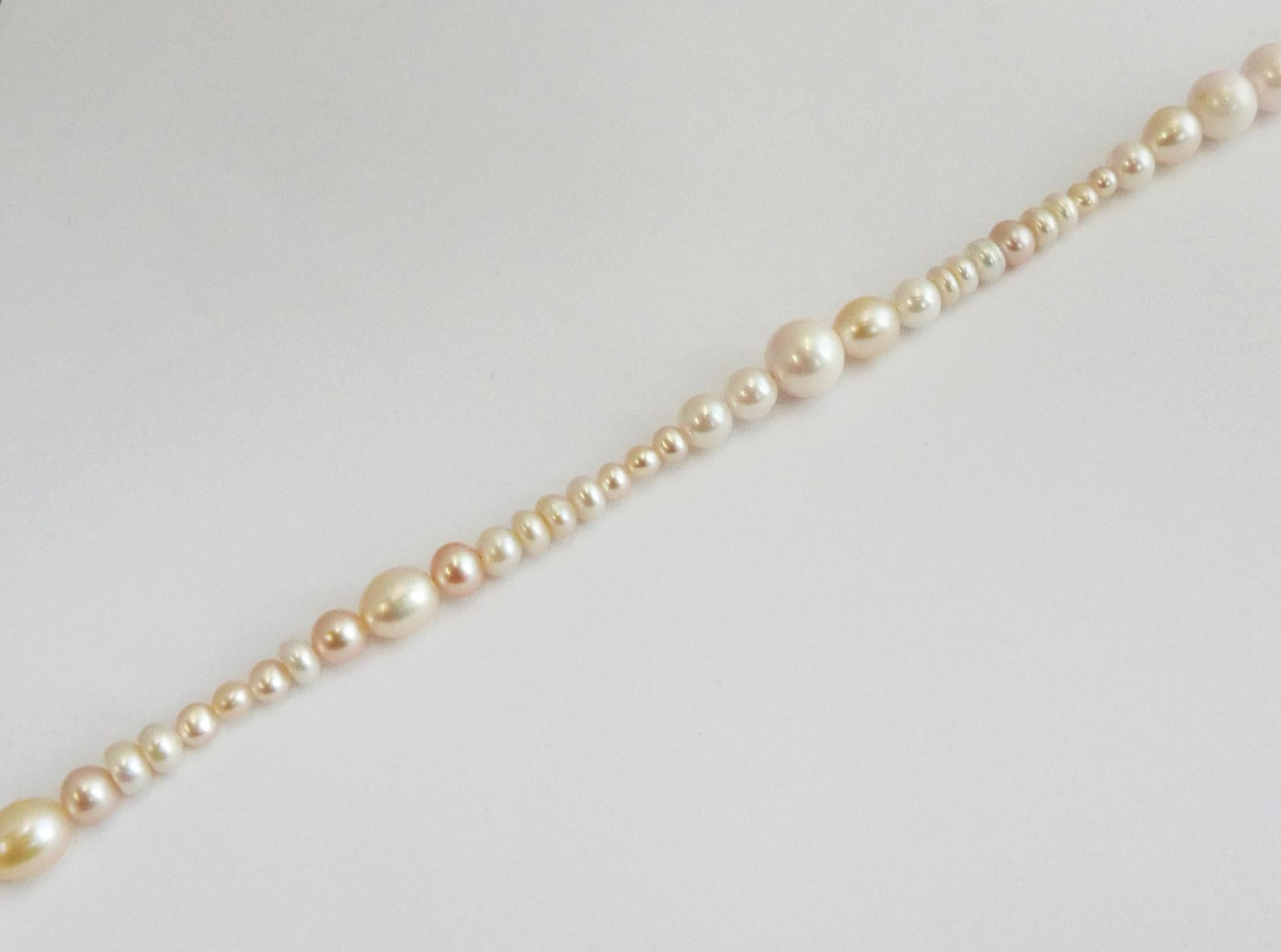 pearl necklace with different size pearls