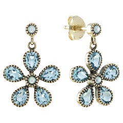 Ohrhänger aus 9 Karat Gelbgold mit Perle und blauem Topas im Vintage-Stil