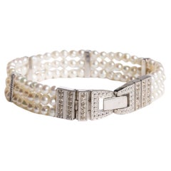 Pulsera de perlas y diamantes