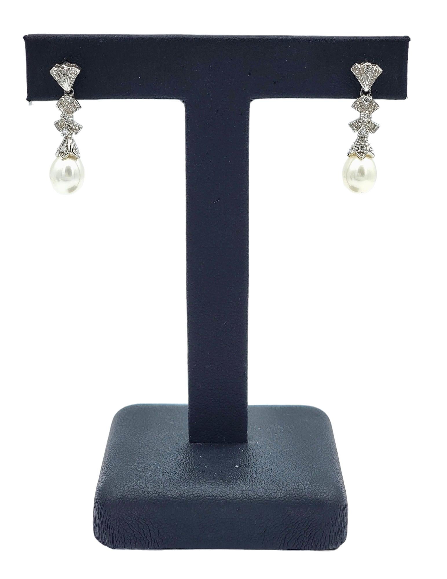 Pearl and Diamond Bow Design Dangle Earrings Set in 14 Karat White Gold For Sale 2